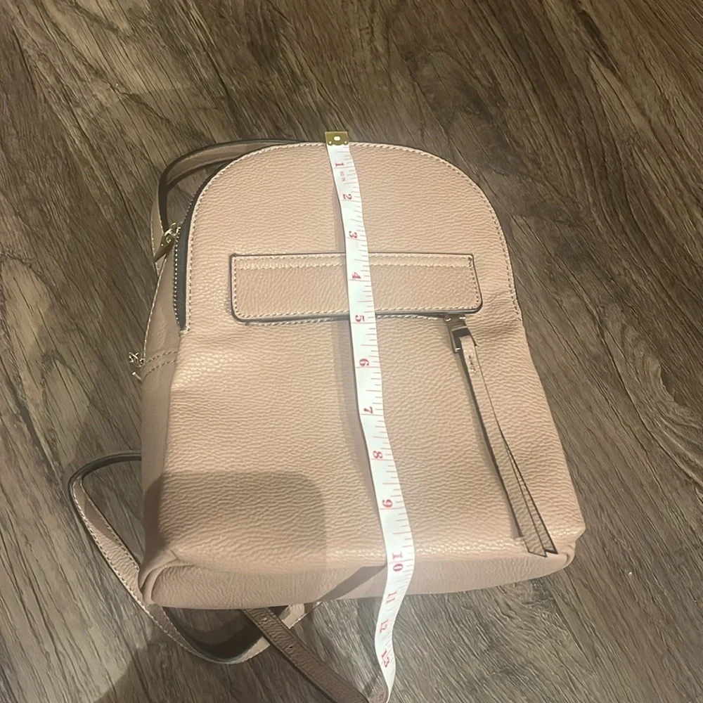 small pink faux leather backpack